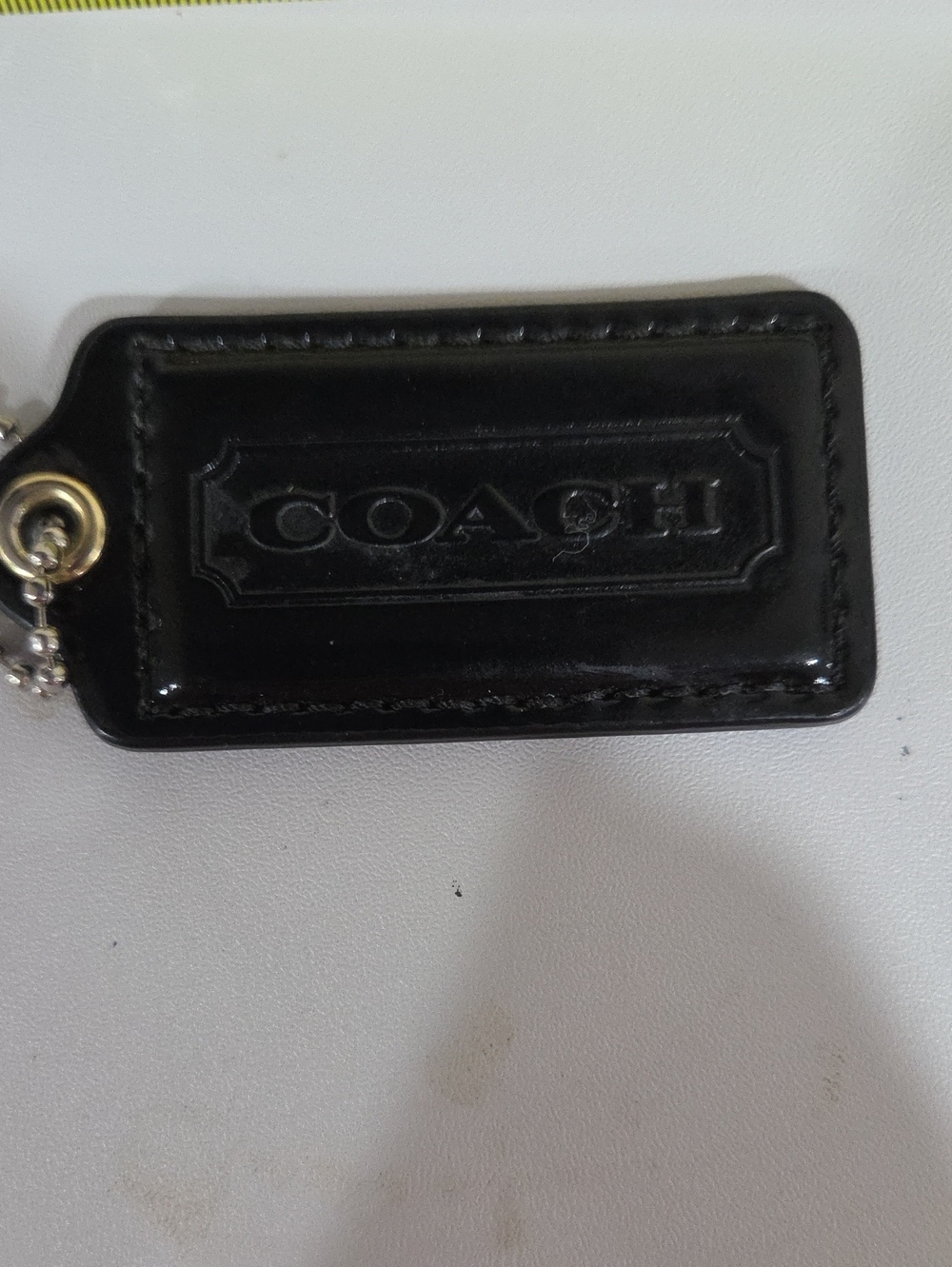 Coach Black Embossed Leather Hang Tag with Metal Ring